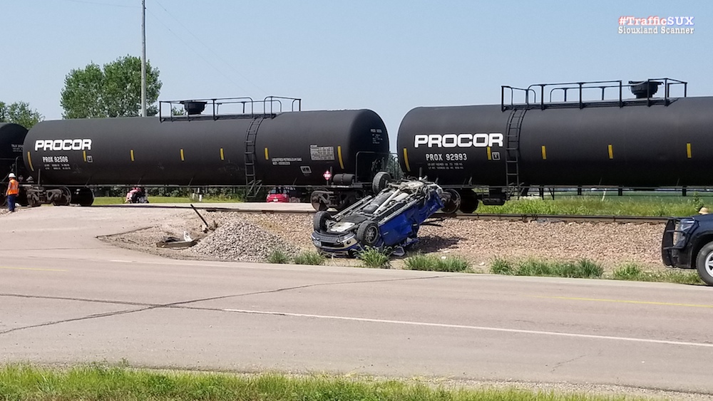 Good Samaritans render aid to occupants of truck struck by a train Thursday