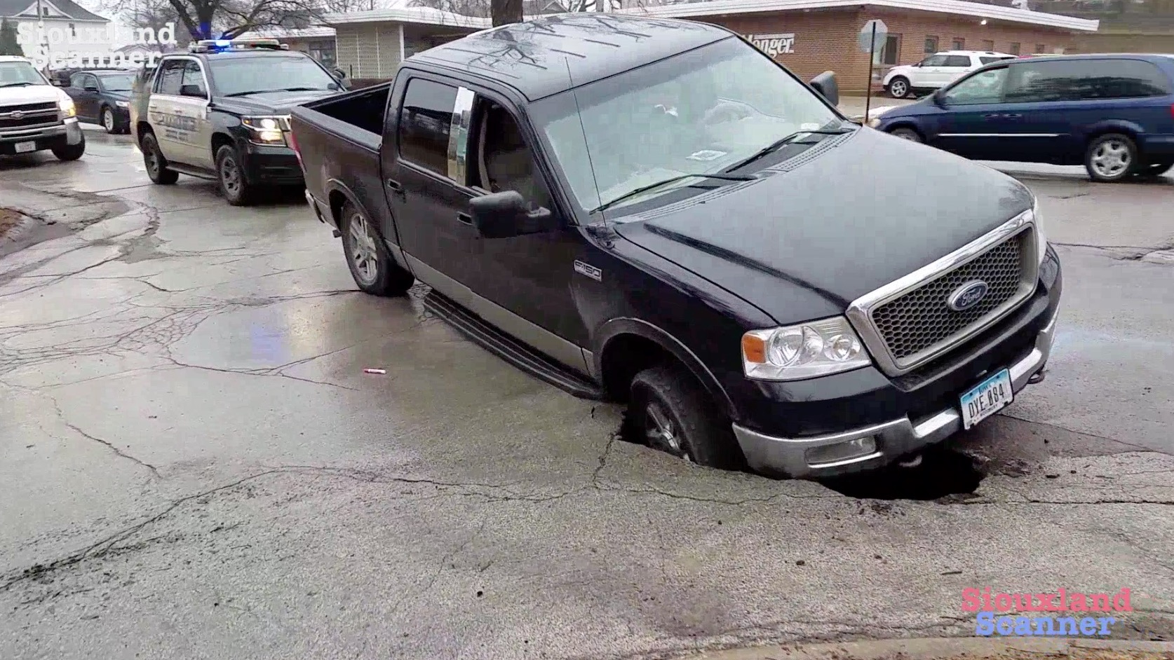 City helping family after sinkhole swallows truck tire