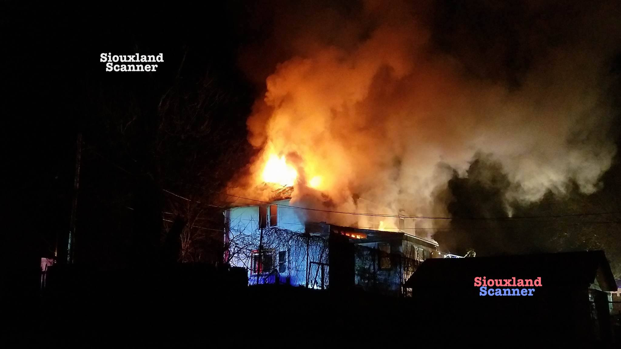 20 foot flames could be seen from burning West Side home Sunday Morning